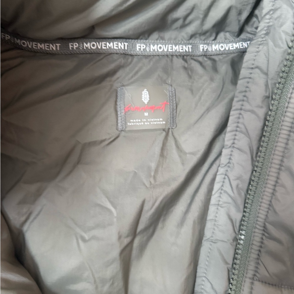 In a bubble puffer vest - Picture 2 of 3
